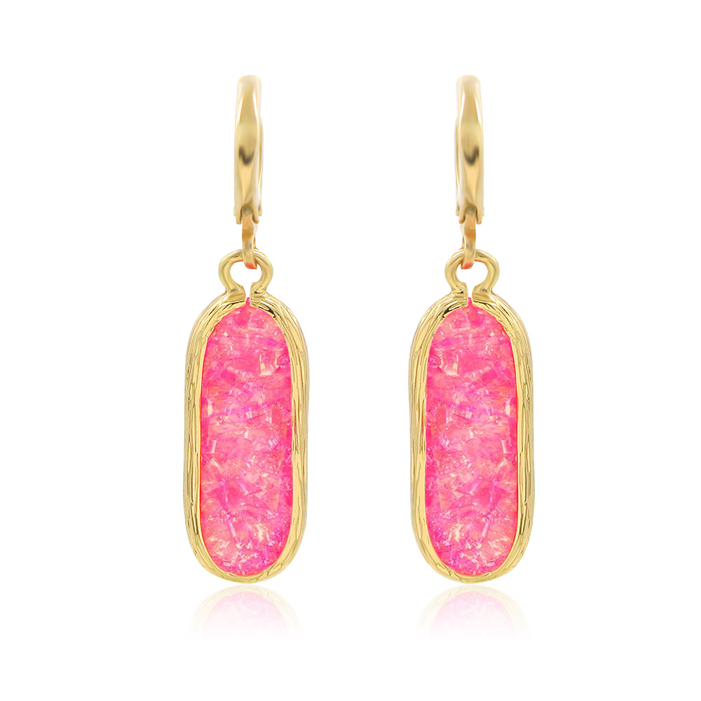 A close-up view of the Pinky Resin Earrings, showcasing the handmade pink resin stone set in a gold-plated brass French hook.