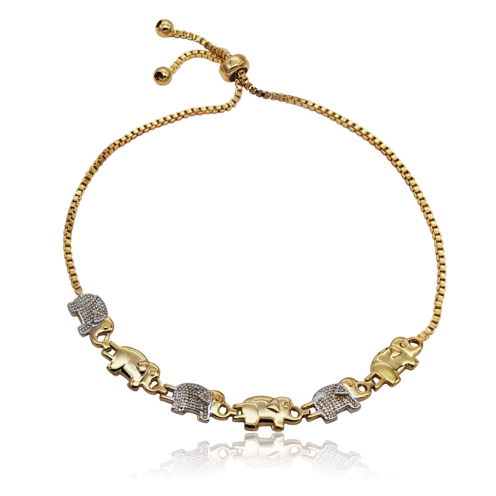 A detailed view of the Elephant Two Tone Adjustable Bracelet, highlighting the intricate gold and rhodium plated elephant charm on a polished brass chain.