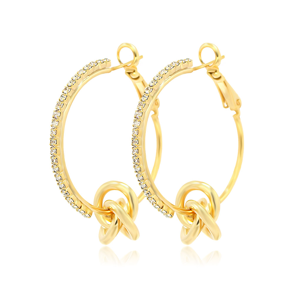 A close-up of the Crystal Love Knot Hoop Earrings, showing the intricate gold-plated knot design and sparkling white Czech crystal accents.