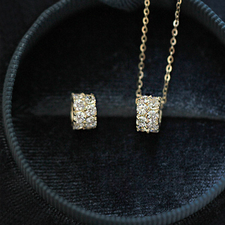 A stunning set of five 925 sterling silver choker necklaces with geometric zircon pendants, displayed in a luxurious gold finish.