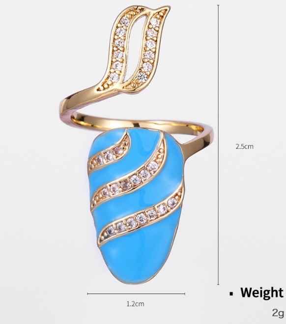 A detailed view of the JR Fashion Finger Nail Ring (JRR-022), showcasing its gold-plated finish, intricate blue stone, and surrounding crystal accents.