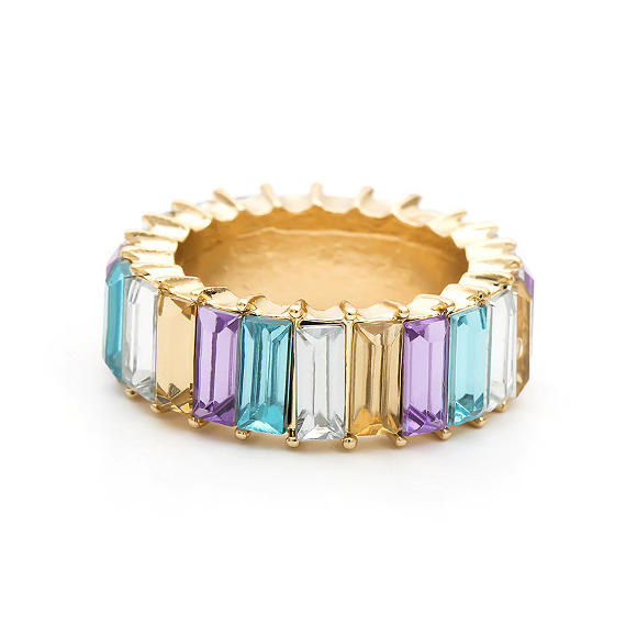 A close-up of the multi-color baguette eternity stack ring, showcasing the vibrant, prong-set cubic zirconia stones on a rose gold-plated band.