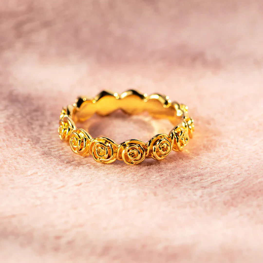 A detailed studio shot of the Eternal Bloom Gold-Plated Rose 925 Sterling Silver Ring, showcasing its intricate rose pattern on a clean white background.