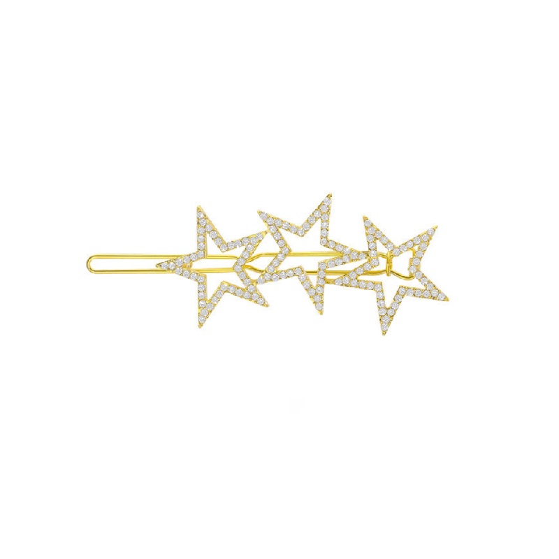 A detailed close-up of the Triple Star Crystal Bobby Pin, highlighting the intricate star design with sparkling clear gemstones and elegant gold plating.