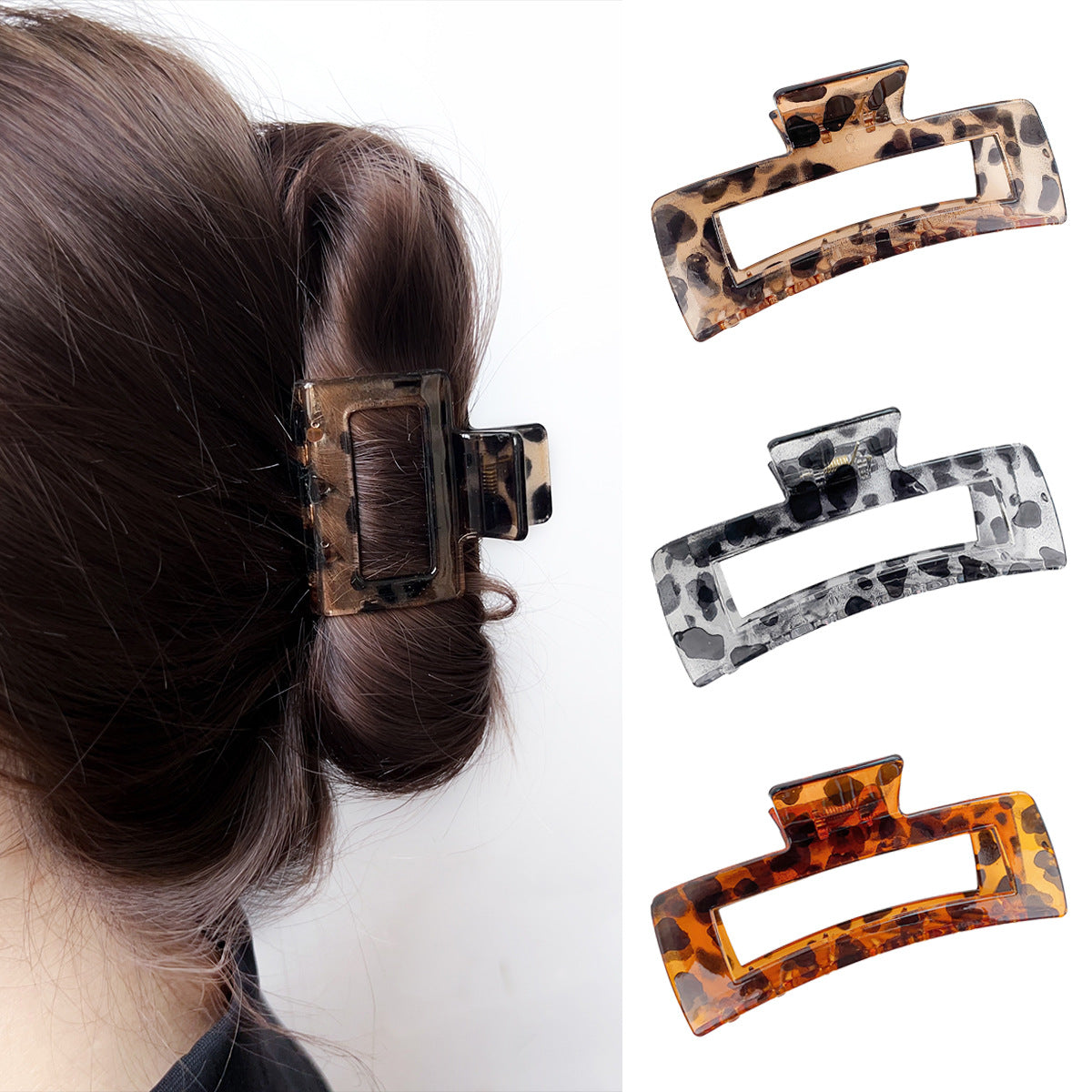 A collection of large hair claw clips in stylish tortoiseshell and leopard patterns, made from durable acetate.