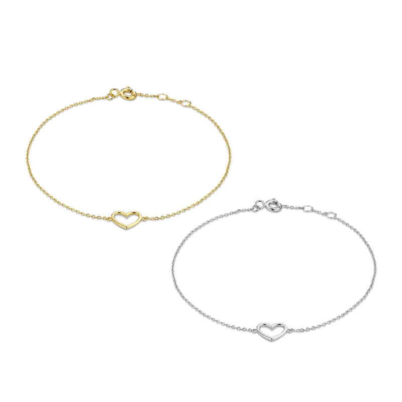 A close-up of two 925 sterling silver hollow heart chain bracelets, one in a polished silver finish and the other in a radiant gold finish, showcasing the delicate design.