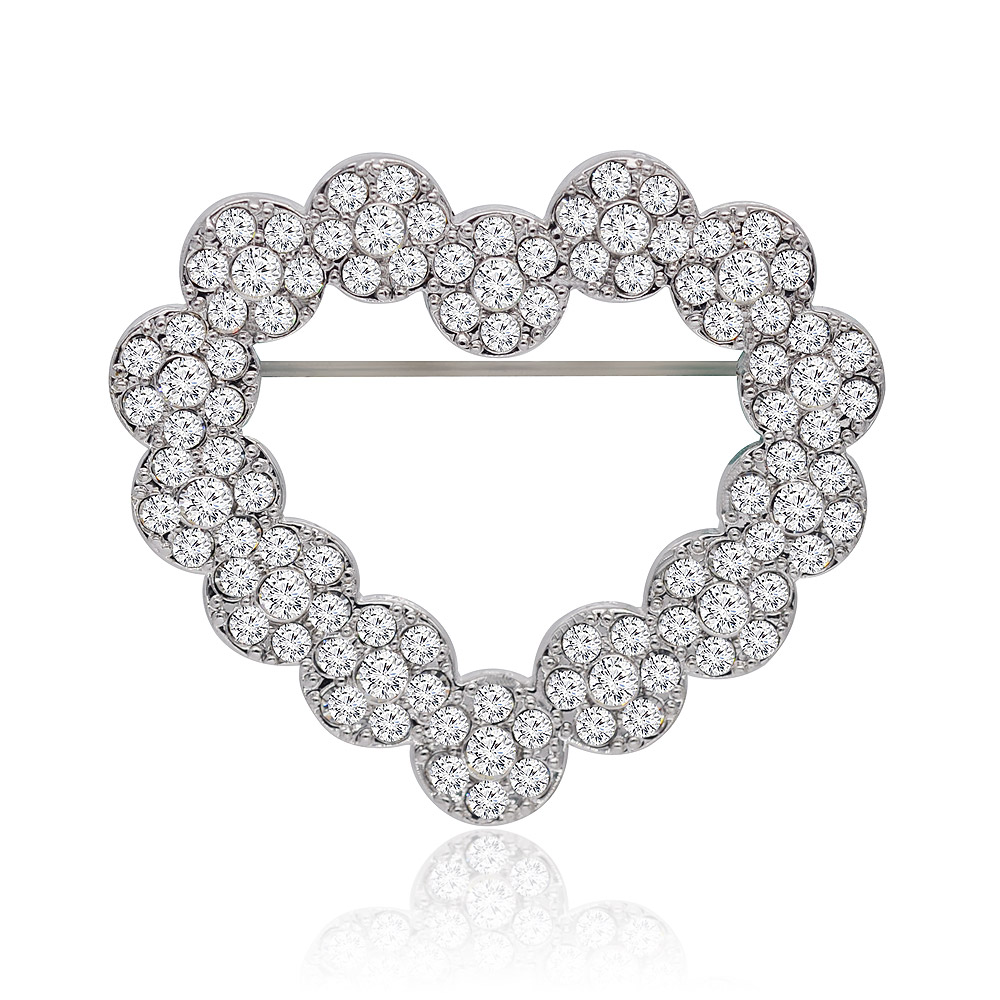 Close-up of a high-quality rhinestone heart embellishment brooch, showcasing its sparkling clear crystal rhinestones on a silver-tone base.