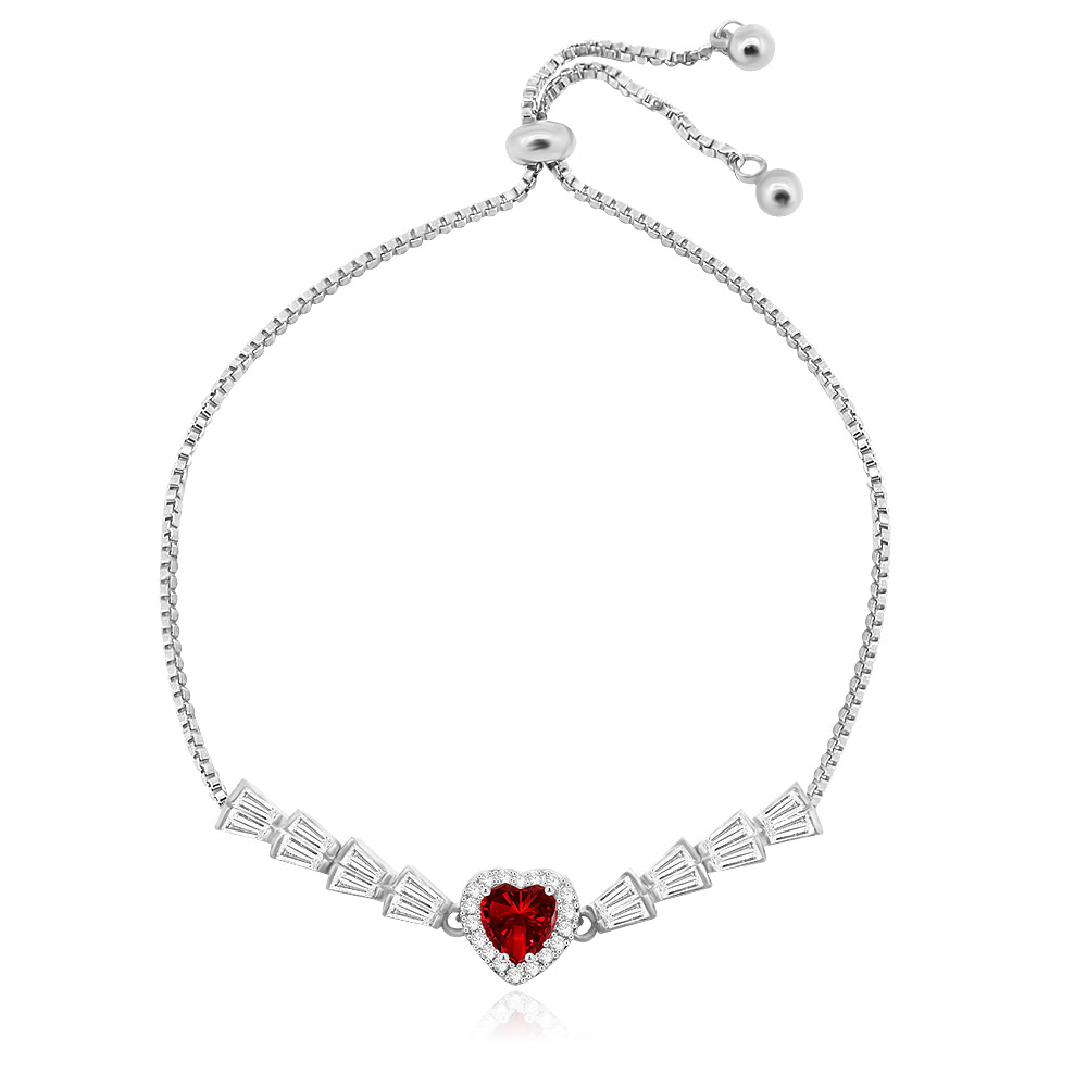 A close-up of the Red & White Heart Shape Tennis Bracelet, showcasing the central heart-shaped red gemstone surrounded by sparkling white cubic zirconia stones on a rhodium-plated brass chain.