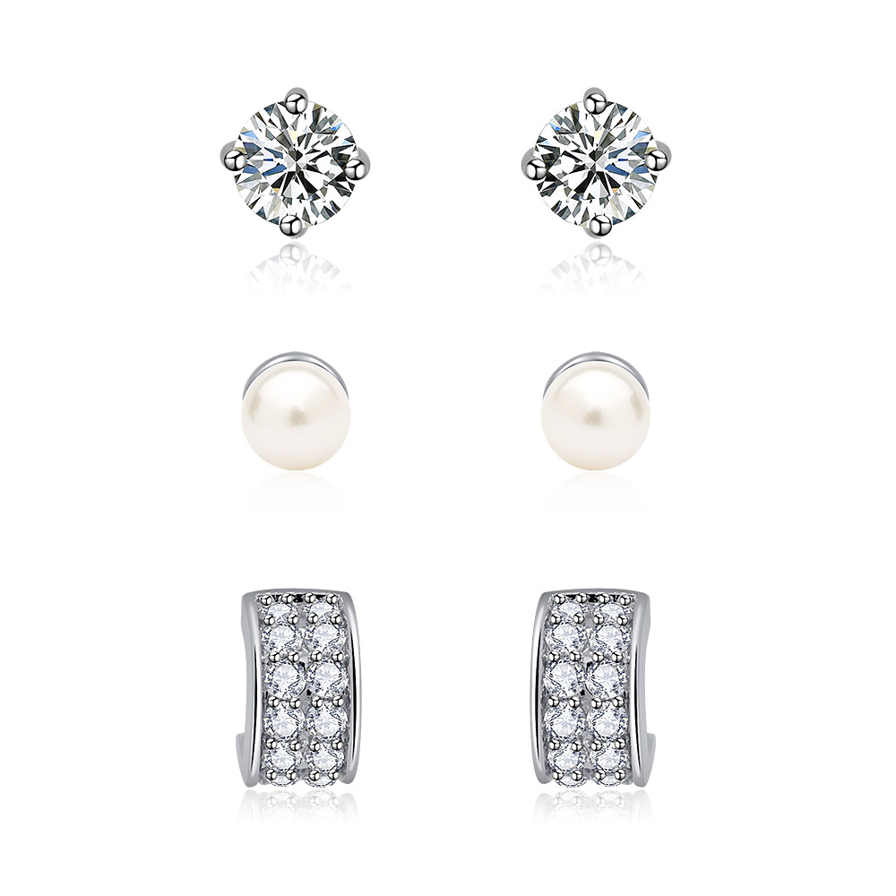 Combo 3-in-1 stud earring set featuring cubic zirconia studs, pearl studs, and small CZ hoop earrings in a rhodium-plated finish.