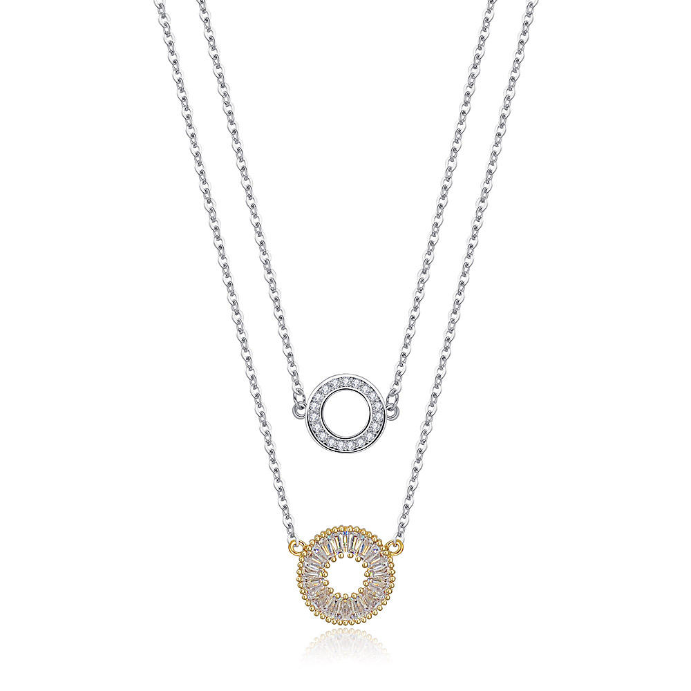 Elegant two-tone layered necklace with sparkling cubic zirconia circle drop pendants.