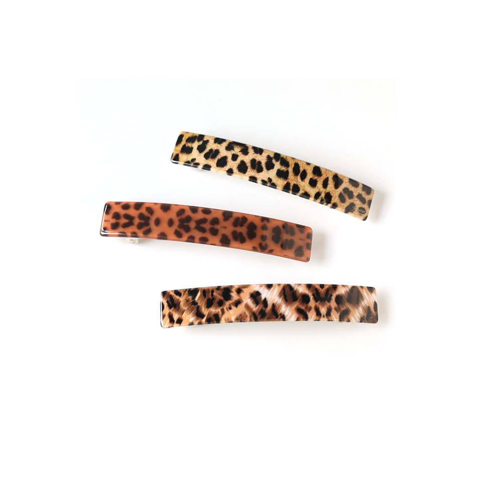 A set of three stylish Acetate Leopard Hairpins, showcasing the classic pattern and high-quality finish. These hypoallergenic hair accessories are available in multiple sizes.