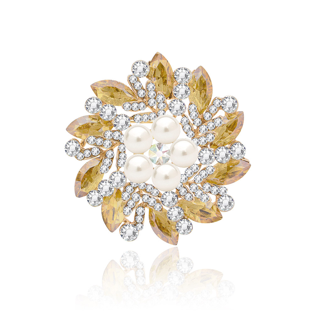 A close-up of the Wholesale Floral Wreath Brooch (JRB-016), showcasing its circular design with intricate crystal flowers, lustrous pearls, and gold plating.
