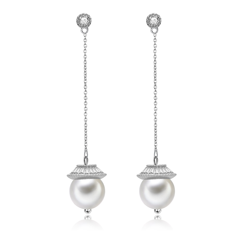 A pair of Drop Of CZ Pearl Earrings featuring large white pearls with elegant silver and sparkling diamond-like accents.