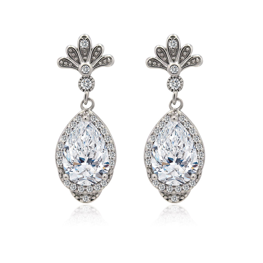 A close-up of the Teardrop Bridal Jewelry Drop Earrings, showcasing the large, sparkling pear-shaped AAA cubic zirconia stone set in rhodium-plated brass.
