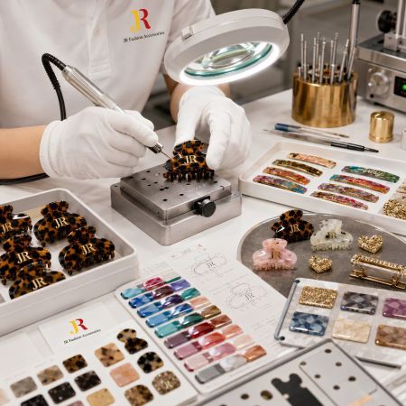 Artisan precision engraving custom logos on wholesale acetate hair clips during B2B OEM manufacturing process.