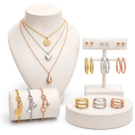 B2B wholesale custom brass jewelry. Layered necklaces, charm bracelets, and mixed metal rings for OEM/ODM manufacturing.