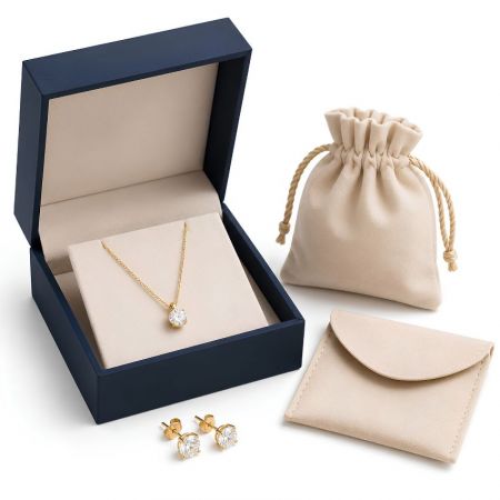 Luxury blue gift box for diamond necklace paired with premium beige microfiber pouch and envelope envelope bag.
