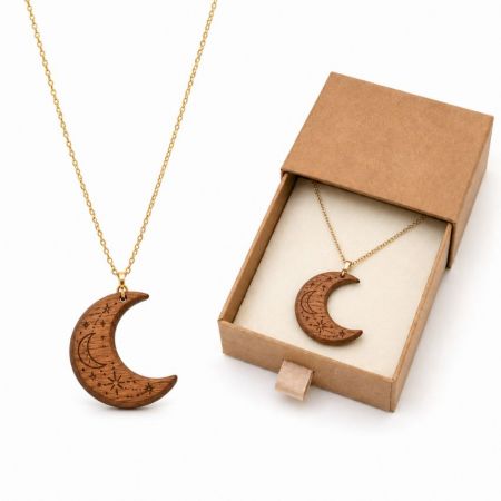 Celestial crescent moon engraved wooden pendant necklace with gold chain and custom branding gift box presentation.