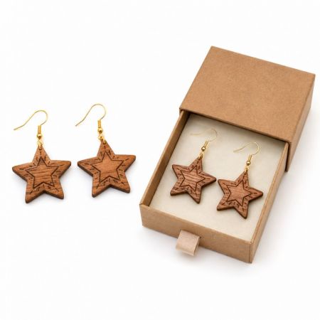 Custom engraved star-shaped wooden drop earrings alongside eco-friendly paper box packaging for corporate gifts.