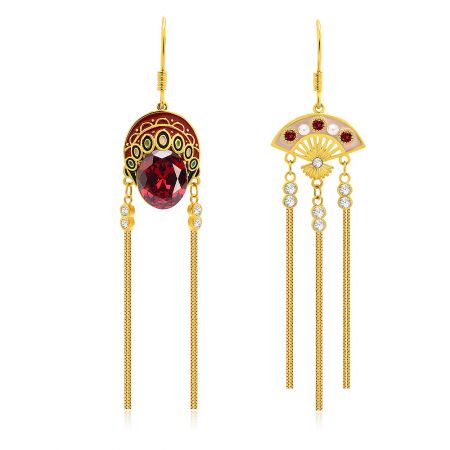 Unique asymmetrical gold earrings inspired by Chinese opera masks, featuring intricate details and vibrant red gemstones.