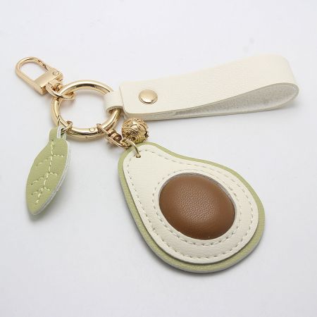 Wholesale PU Leather Avocado Keychain Bag Charm (5 pcs) - Wholesale PU leather avocado keychain with a wristlet strap, perfect as a cute bag charm for resale.