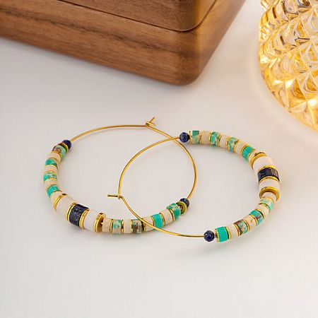 Boho-style stainless steel hoop earrings with vintage Lazurite beading.