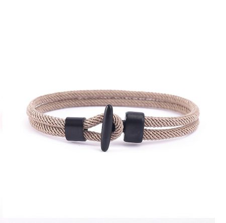 Beige nylon wrist rope bracelet for men with a black toggle clasp.