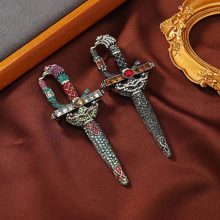 A pair of retro-style crystal sword brooches, perfect for men's suits and formal wear.