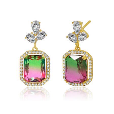 Detailed close-up of the bi-color tourmaline Swarovski crystal on the gold-plated earrings.