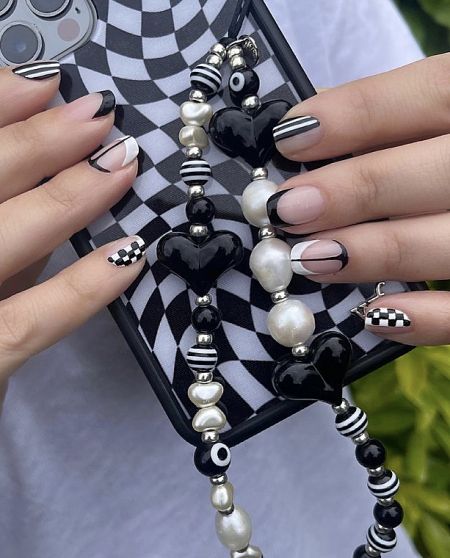 Beaded Phone Charm Strap - A stylish beaded phone charm strap with colorful beads attached to a black and white checkered phone case, showcasing a trendy accessory from JR Fashion Accessories.