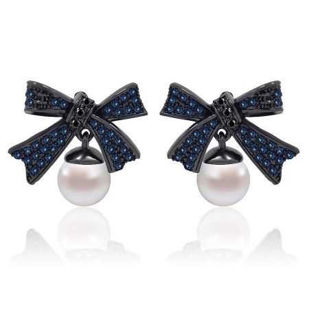 Blue Bow Pearl Earring - Front view of the Blue Bow Pearl Earring, showcasing the intricate bow design with vibrant blue sapphire CZ and a lustrous white pearl on a hematite plated base.