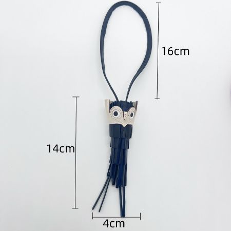 Detailed size and measurements of the leather owl keychain tassel charm.