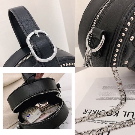 Detailed view of the black PU leather handbag with silver hardware and chain strap.