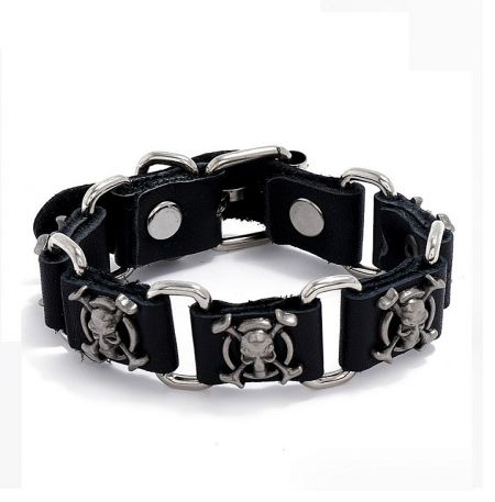 Skull PU Leather Bracelet For Men - A close-up view of the Skull PU Leather Bracelet for Men, showcasing the detailed stainless steel skull accent on the black braided leather band.