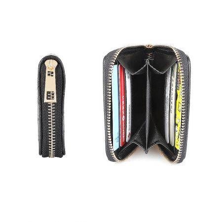 Interior view of the black croc purse showing multiple card slots and coin compartments.