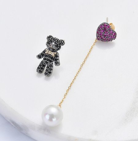 Alternative color style for the Bear's Heart Dangling Earrings, featuring a black bear and purple accents.