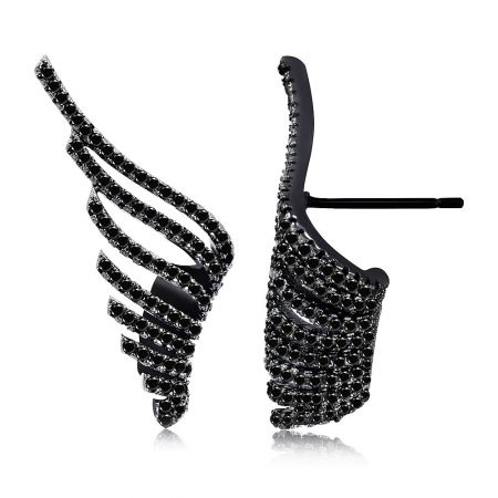 Detailed view of the dark wing earrings showing the wavy, multi-strand design with embedded dark stones.