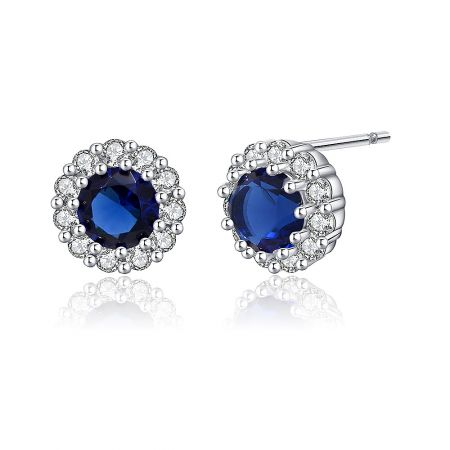 Top-down perspective of the Rhodium Montana Stud Earring, detailing the intricate setting and the brilliant contrast between the blue and white stones.