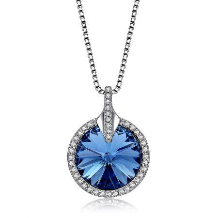 Detailed view of the blue gemstone pendant with diamond accents on the Crystal Round Glance necklace.
