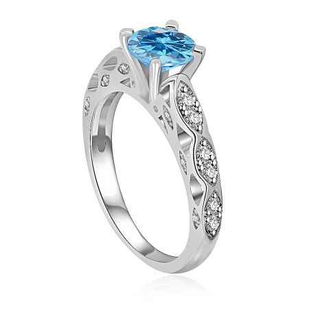 Side view of the Aquamarine Rider Ring showing the blue gemstone and accent stones.