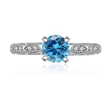 Aquamarine Rider Ring - Aquamarine Rider Ring with a prominent blue gemstone centerpiece and white cubic zirconia accents on a rhodium-plated band.