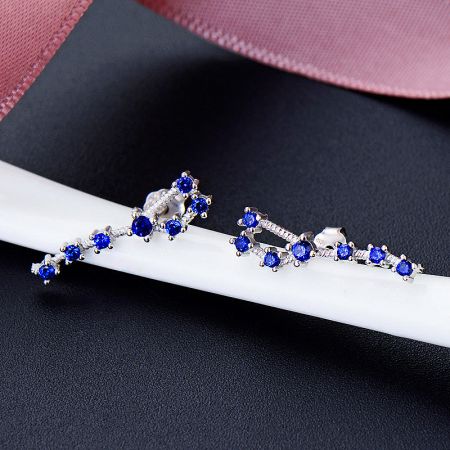 An elegant pair of blue Big Dipper stud earrings crafted from 925 sterling silver.