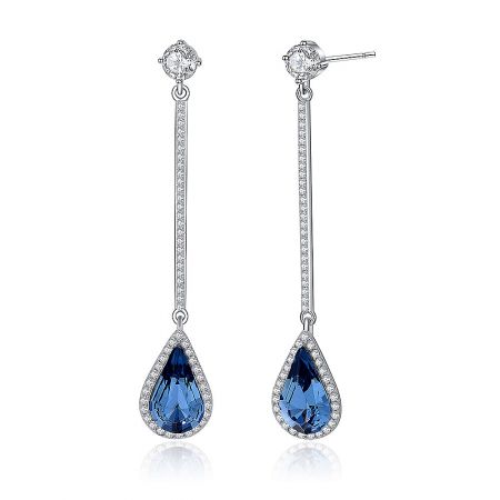 Detailed close-up of the blue teardrop Swarovski crystal earring, highlighting the intricate bar design with clear crystals.
