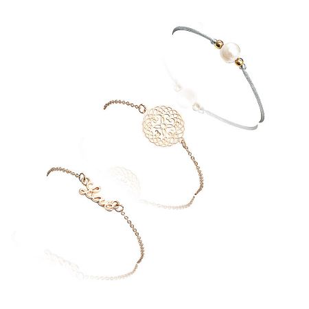 Love Pearl Stacking Bracelet - A collection of three Love Pearl Stacking Bracelets, featuring gold-plated brass, pearls, and unique charms, displayed on a white background.