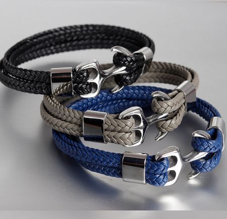 Collection of men's anchor bracelets available in various braided leather colors.