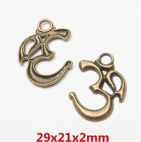 Two custom OM symbol charms in a rich bronze finish, highlighting material versatility.