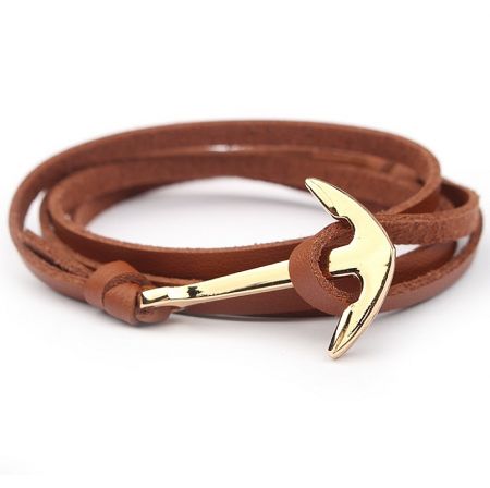 Brown PU leather bracelet with a unique gold axe-shaped clasp.