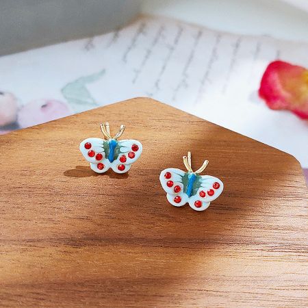 Another design from the 5-pair set, featuring white wings and a blue center.