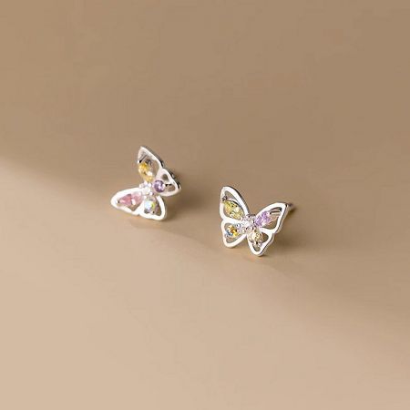 Another perspective of the silver butterfly earrings highlighting the colorful gemstones.