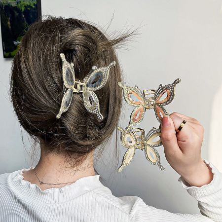 A collection of decorative butterfly hair clips in various styles and colors.